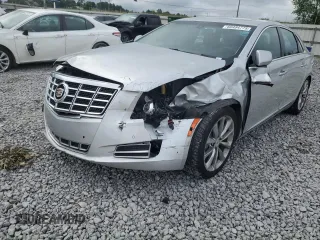 2013 Cadillac XTS Luxury with VIN 2G61P5S32D9214720, listed as a Copart auction lot 60484775 with 123,625 mi miles and Salvage title. Bid and sale history available at DreamBid. Image 1.
