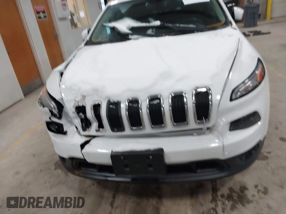 2015 Jeep Cherokee Latitude z VIN 1C4PJMCB4FW635406, wystawiony jako IAAI lot #41168412 z przebiegiem 131 089 mil mil oraz . Historia ofert i sprzedaży dostępna na DreamBid. Obrazek 12.