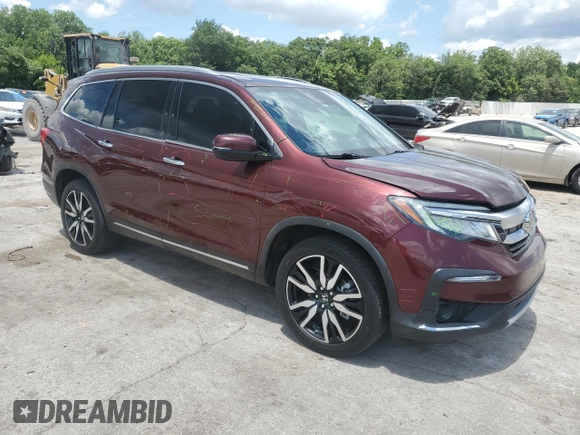 2019 Honda Pilot Touring 7-Passenger with VIN 5FNYF6H6XKB094020, listed as a Copart auction lot 61460255 with 135,149 mi miles and Salvage title. Bid and sale history available at DreamBid. Image 4.
