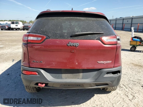 2016 Jeep Cherokee Trailhawk with VIN 1C4PJMBS0GW277367, listed as a Copart auction lot 49656155 with Not Provided miles and Salvage Title. Bid and sale history available at DreamBid. Image 6.
