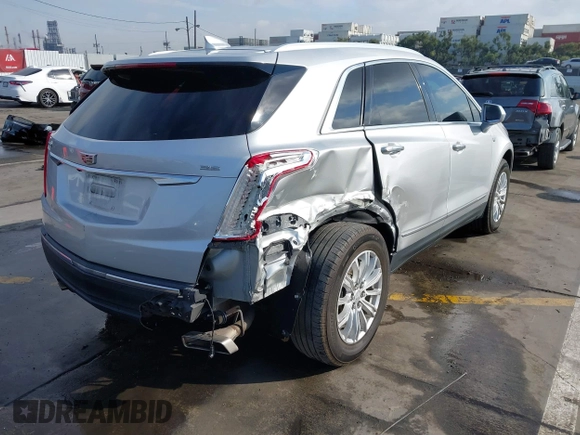 2017 Cadillac XT5 FWD with VIN 1GYKNARS7HZ144148, listed as a IAAI auction lot 41392399 with 96,252 mi miles and . Bid and sale history available at carsss.com. Image 4.