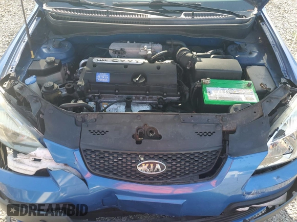 2009 Kia Rio LX with VIN KNADE223296515613, listed as a Copart auction lot 62008194 with 143,238 mi miles and Salvage Title. Bid and sale history available at carsss.com. Image 13.