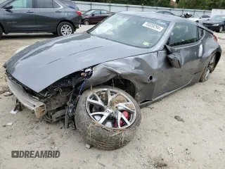 2016 Nissan 370Z Sport z VIN JN1AZ4EH0GM930115, wystawiony jako Copart lot #70339294 z przebiegiem Nie podano mil oraz Szkody całkowita. Historia ofert i sprzedaży dostępna na DreamBid. Obrazek 1.
