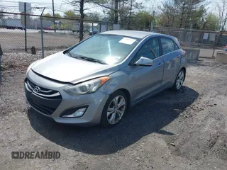 2014 Hyundai Elantra GT with VIN KMHD35LH8EU216052, listed as a IAAI auction lot 42102173 with 112,129 mi miles. Bid and sale history available at carsss.com. Image 2.