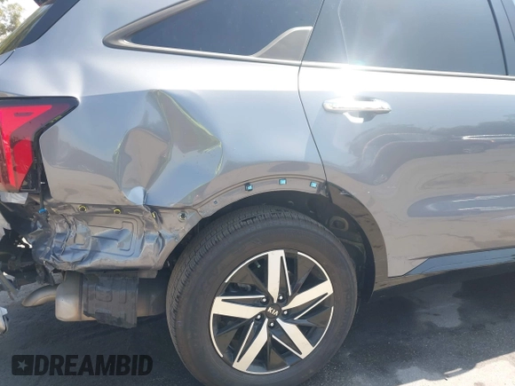 2021 Kia Sorento S with VIN 5XYRL4LCXMG073937, listed as a IAAI auction lot 42595810 with 71,507 mi miles and . Bid and sale history available at DreamBid. Image 6.