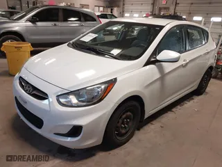 2013 Hyundai Accent GL with VIN KMHCT5AE1DU088241, listed as a IAAI auction lot 41909194 with 87,622 mi miles. Bid and sale history available at carsss.com. Image 2.