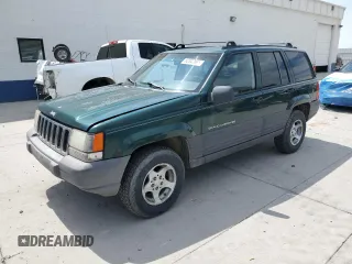 1996 Jeep Grand Cherokee Laredo z VIN 1J4GZ58S8TC222435, wystawiony jako Copart lot #62347665 z przebiegiem 202 125 mil mil oraz Czysty tytuł • Clean title. Historia ofert i sprzedaży dostępna na DreamBid. Obrazek 1.