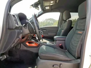 2022 Nissan Frontier SV with VIN 1N6ED1EJ6NN619016, listed as a Copart auction lot 58311855 with 56,943 mi miles and Clean title. Bid and sale history available at DreamBid. Image 7.