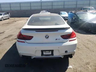 2016 BMW M6 z VIN WBS6J9C56GD934498, wystawiony jako Copart lot #73539754 z przebiegiem 116 944 mil mil oraz Czysty tytuł • Clean title. Historia ofert i sprzedaży dostępna na DreamBid. Obrazek 6.