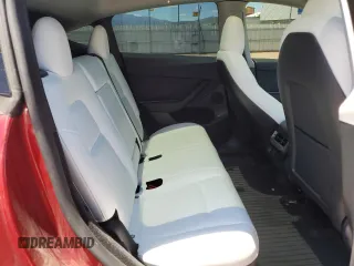 2024 Tesla Model Y Long Range z VIN 7SAYGDEE6RF156183, wystawiony jako Copart lot #61410155 z przebiegiem 27 112 mil mil oraz Szkoda całkowita • Salvage title. Historia ofert i sprzedaży dostępna na DreamBid. Obrazek 10.