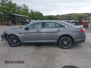 2014 Ford Taurus SHO with VIN 1FAHP2KTXEG160800, listed as a IAAI auction lot 42083237 with 75,048 mi miles. Bid and sale history available at carsss.com. Image 15.