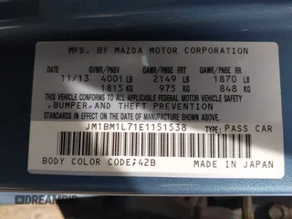 2014 Mazda 3 i Touring with VIN JM1BM1L71E1151538, listed as a IAAI auction lot 42148640 with 136,564 mi miles and . Bid and sale history available at DreamBid. Image 9.