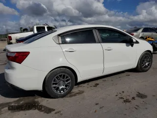2014 Kia Rio LX with VIN KNADM4A35E6346018, listed as a Copart auction lot 85544104 with 76,455 mi miles and Salvage Title. Bid and sale history available at carsss.com. Image 3.