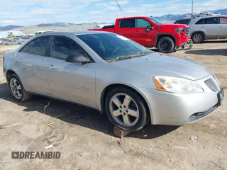 2005 Pontiac G6 GT with VIN 1G2ZH528454152965, listed as a IAAI auction lot 41849100 with 220,177 mi miles. Bid and sale history available at carsss.com. Image 1.