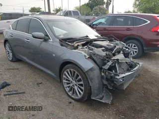 2021 Cadillac CT5 Premium Luxury z VIN 1G6DN5RK3M0146941, wystawiony jako IAAI lot #41934950 z przebiegiem Nie podano mil oraz . Historia ofert i sprzedaży dostępna na DreamBid. Obrazek 1.