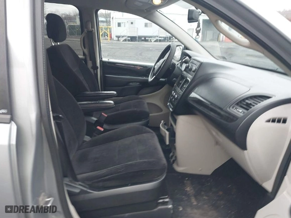 2014 Dodge Grand Caravan SE with VIN 2C4RDGBGXER106984, listed as a IAAI auction lot 41815414 with 170,984 mi miles. Bid and sale history available at carsss.com. Image 5.
