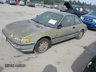1990 Acura Integra z VIN JH4DA9440LS059914, wystawiony jako IAAI lot #41720214 z przebiegiem 147 590 mil mil oraz . Historia ofert i sprzedaży dostępna na DreamBid. Obrazek 2.