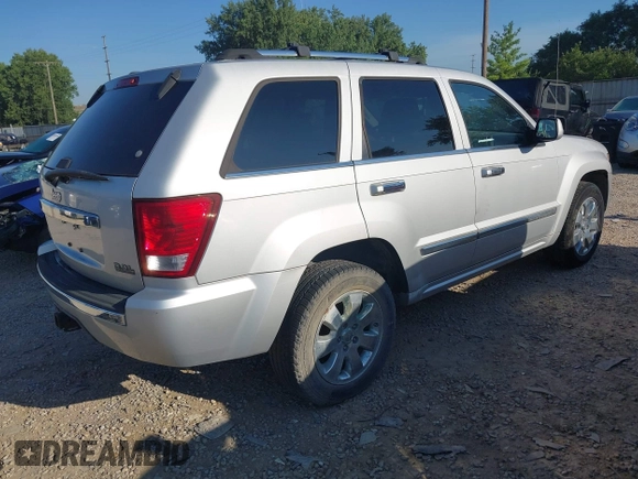 2008 Jeep Grand Cherokee Overland with VIN 1J8HR68M68C242958, listed as a IAAI auction lot 42820206 with 214,472 mi miles and . Bid and sale history available at DreamBid. Image 4.