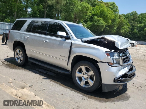 2017 Chevrolet Tahoe LS with VIN 1GNSCAKC4HR403104, listed as a Copart auction lot 57823865 with 185,407 mi miles and Salvage title. Bid and sale history available at DreamBid. Image 4.