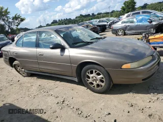 2002 Oldsmobile Intrigue GX z VIN 1G3WH52H42F177749, wystawiony jako Copart lot #66168834 z przebiegiem 80 520 mil mil oraz Szkody całkowita. Historia ofert i sprzedaży dostępna na DreamBid. Obrazek 4.