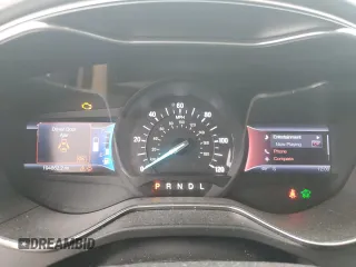 2013 Ford Fusion SE Hybrid с VIN 3FA6P0LU9DR233472, выставлен на аукционе Copart как лот 57994345 с пробегом 194 862 миль миль и Списание • Salvage title. История ставок и продаж доступна на DreamBid. Изображение 9.