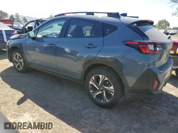 2024 Subaru Crosstrek Premium z VIN JF2GUADC9R8305042, wystawiony jako Copart lot #55796805 z przebiegiem 9 518 mil mil oraz Szkoda całkowita • Salvage title. Historia ofert i sprzedaży dostępna na DreamBid. Obrazek 2.