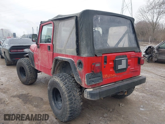 2002 Jeep Wrangler X z VIN 1J4FA39S52P708519, wystawiony jako IAAI lot #41569747 z przebiegiem 219 168 mil mil oraz . Historia ofert i sprzedaży dostępna na DreamBid. Obrazek 3.