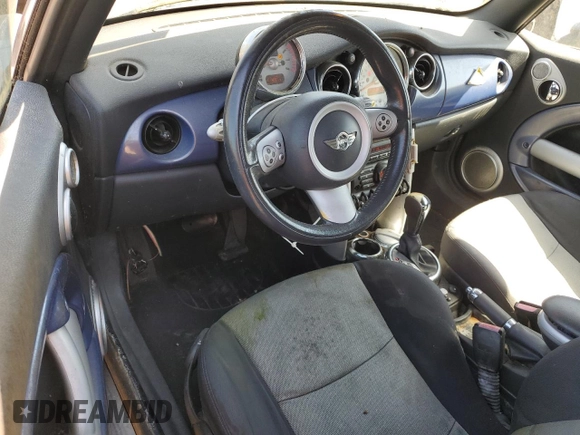 2006 MINI Convertible with VIN WMWRF33556TG14421, listed as a Copart auction lot 50090415 with 136,736 mi miles and Non repairable. Bid and sale history available at DreamBid. Image 8.