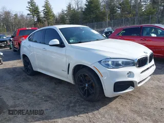 2015 BMW X6 xDrive35i with VIN 5UXKU2C50F0N77117, listed as a IAAI auction lot 41901159 with 104,820 mi miles. Bid and sale history available at carsss.com. Image 1.