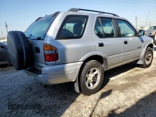 2001 Honda Passport LX z VIN 4S6CK58WX14410363, wystawiony jako Copart lot #77500294 z przebiegiem 195 272 mil mil oraz Czysty tytuł • Clean title. Historia ofert i sprzedaży dostępna na DreamBid. Obrazek 3.
