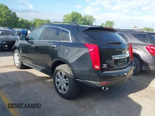 2012 Cadillac SRX with VIN 3GYFNGE3XCS657211, listed as a IAAI auction lot 42214105 with 149,075 mi miles and . Bid and sale history available at carsss.com. Image 3.