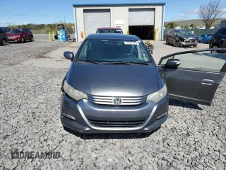 2010 Honda Insight LX z VIN JHMZE2H59AS000085, wystawiony jako Copart lot #54932975 z przebiegiem 218 961 mil mil oraz Szkoda całkowita • Salvage title. Historia ofert i sprzedaży dostępna na DreamBid. Obrazek 5.