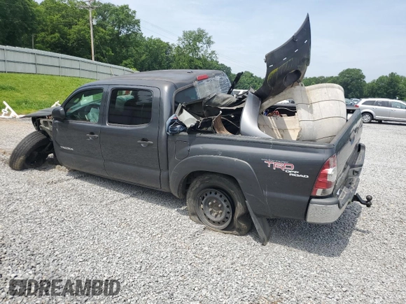 2010 Toyota Tacoma PreRunner with VIN 5TEJU4GN7AZ711911, listed as a Copart auction lot 60200385 with 209,579 mi miles and Salvage title. Bid and sale history available at DreamBid. Image 2.