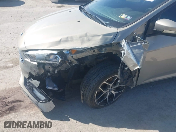 2015 Ford Focus SE with VIN 1FADP3F24FL260387, listed as a IAAI auction lot 41990194 with 80,673 mi miles. Bid and sale history available at carsss.com. Image 6.