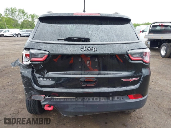 2019 Jeep Compass Trailhawk with VIN 3C4NJDDB7KT727762, listed as a IAAI auction lot 42299260 with 56,733 mi miles and . Bid and sale history available at DreamBid. Image 16.