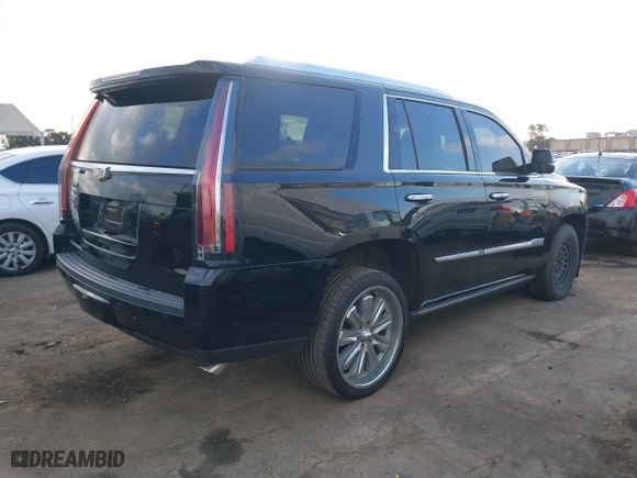 2018 Cadillac Escalade Platinum with VIN 1GYS4DKJ3JR200016, listed as a IAAI auction lot 41367220 with 105,043 mi miles. Bid and sale history available at carsss.com. Image 4.