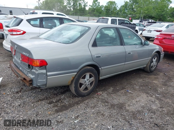 2001 Toyota Camry CE z VIN JT2BG22K410587070, wystawiony jako IAAI lot #42388043 z przebiegiem 119 183 mil mil oraz . Historia ofert i sprzedaży dostępna na DreamBid. Obrazek 4.
