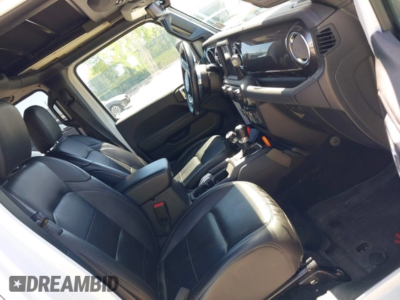 2021 Jeep Wrangler Unlimited Sahara z VIN 1C4HJXEN2MW528137, wystawiony jako IAAI lot #42134514 z przebiegiem 50 030 mil mil oraz . Historia ofert i sprzedaży dostępna na DreamBid. Obrazek 5.