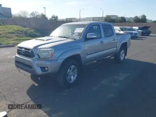 2014 Toyota Tacoma PreRunner with VIN 5TFJU4GN3EX051198, listed as a IAAI auction lot 41764088 with 126,259 mi miles. Bid and sale history available at carsss.com. Image 2.
