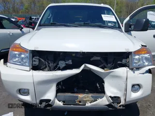 2012 Nissan Titan SV with VIN 1N6AA0EC0CN307743, listed as a IAAI auction lot 42085082 with 187,506 mi miles. Bid and sale history available at carsss.com. Image 6.