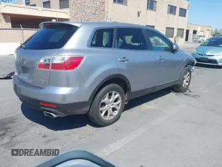 2011 Mazda CX-9 Sport with VIN JM3TB2BVXB0307360, listed as a IAAI auction lot 42580629 with 136,928 mi miles and . Bid and sale history available at DreamBid. Image 4.
