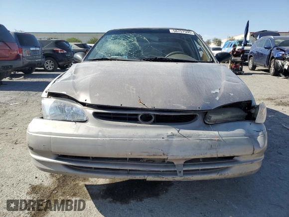 1999 Toyota Corolla VE with VIN 1NXBR12E9XZ158252, listed as a Copart auction lot 58757595 with 232,776 mi miles and Salvage title. Bid and sale history available at DreamBid. Image 5.