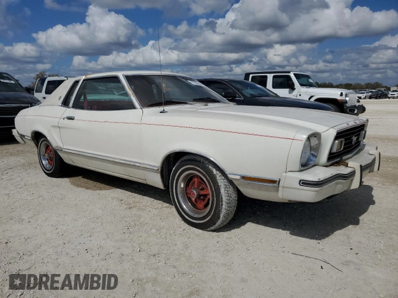 1977 Ford Mustang z VIN 7F04Z150204, wystawiony jako Copart lot #77276344 z przebiegiem 94 802 mil mil oraz Szkoda całkowita • Salvage title. Historia ofert i sprzedaży dostępna na DreamBid. Obrazek 4.