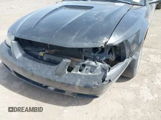 2004 Ford Mustang Standard with VIN 1FAFP40604F156534, listed as a IAAI auction lot 41794486 with 216,207 mi miles. Bid and sale history available at carsss.com. Image 6.