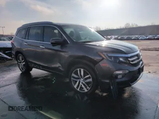 2017 Honda Pilot Touring with VIN 5FNYF6H95HB083610, listed as a Copart auction lot 50806045 with 200,897 mi miles and Salvage Title. Bid and sale history available at DreamBid. Image 4.