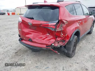 2017 Toyota RAV4 LE with VIN JTMZFREV5HJ150075, listed as a IAAI auction lot 41854099 with 151,407 mi miles and . Bid and sale history available at carsss.com. Image 6.