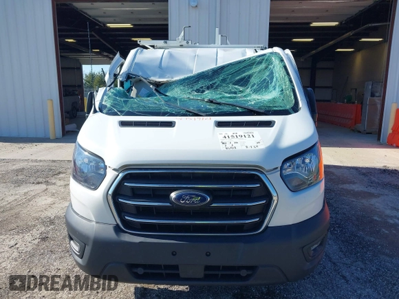 2020 Ford Transit Cargo with VIN 1FTBR1Y8XLKA84383, listed as a IAAI auction lot 41519121 with 61,410 mi miles and . Bid and sale history available at DreamBid. Image 12.
