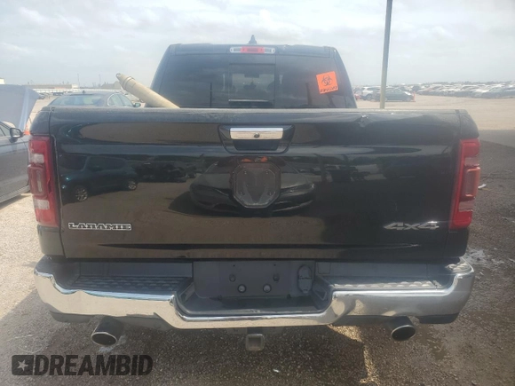 2019 Ram 1500 Laramie z VIN 1C6SRFJT8KN809379, wystawiony jako Copart lot #52827415 z przebiegiem Nie podano mil oraz Czysty tytuł • Clean title. Historia ofert i sprzedaży dostępna na DreamBid. Obrazek 6.