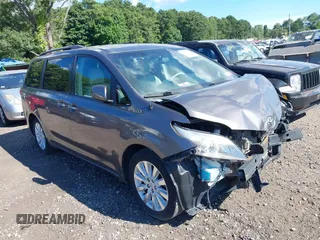 2013 Toyota Sienna XLE z VIN 5TDDK3DC6DS055136, wystawiony jako IAAI lot #40085074 z przebiegiem 162 022 mil mil oraz . Historia ofert i sprzedaży dostępna na DreamBid. Obrazek 1.