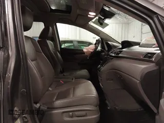 2016 Honda Odyssey Touring Elite with VIN 5FNRL5H92GB045824, listed as a IAAI auction lot 41872220 with 120,557 mi miles. Bid and sale history available at carsss.com. Image 5.